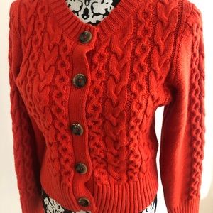 Anthropologie Maeve Orange Cardigan sweater.